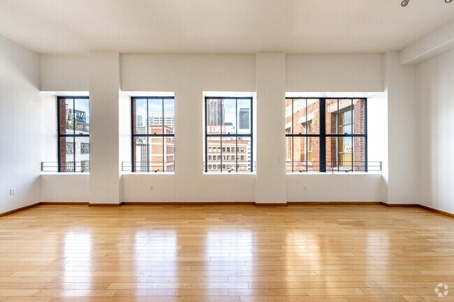 1BR, 1BA - 945SF - LIVING ROOM - Spring Arcade Building