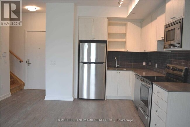 Photo du bâtiment - 155-155 Downsview Park Blvd