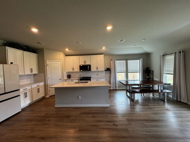 Building Photo - Modern 4-Bedroom Home with Office | 3-Car ...