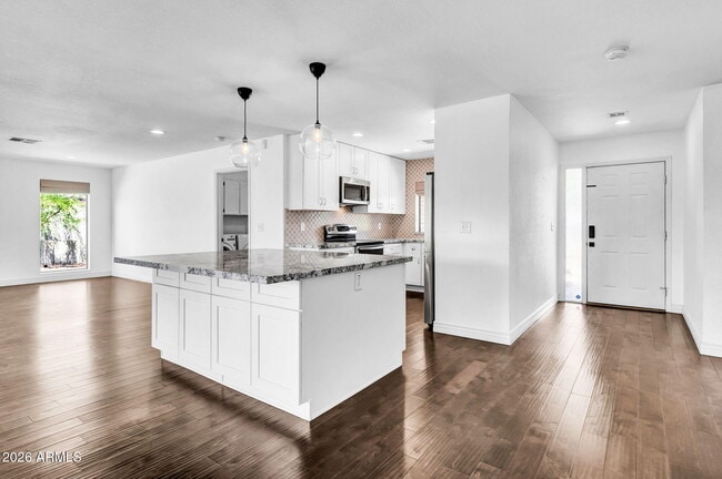 Foto del edificio - 5219 E Winchcomb Dr