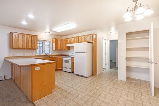 Similar layout but with new appliances, flooring, paint, and lighting. - 4865 W Reliance Rd