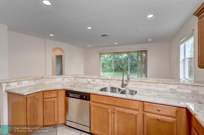 Foto del edificio - 4198 NW Burr Oak Ct
