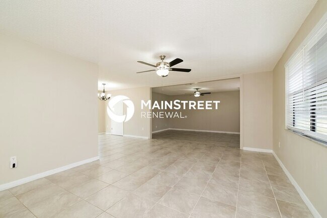 Building Photo - 4 Bedroom Pet-Friendly Home in auburndale, FL with Main Street Renewal