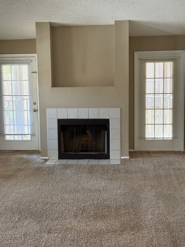 Building Photo - WRAP AROUND PATIO  - LARGE TWO BEDROOM READY NOW!!  $1400 MONTHLY RENT includes water