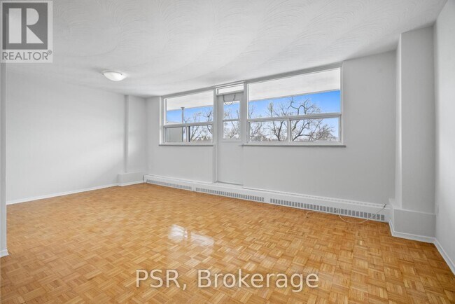 Building Photo - 105-105 Rowena Dr