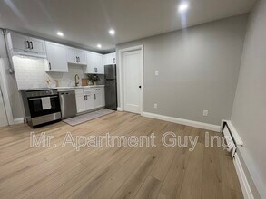 Building Photo - 1148 Queen's Blvd