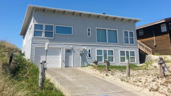 Building Photo - 702 NW Oceania Dr