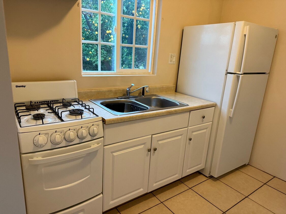 Stove, sink and refrigerator - 17526 Horace St