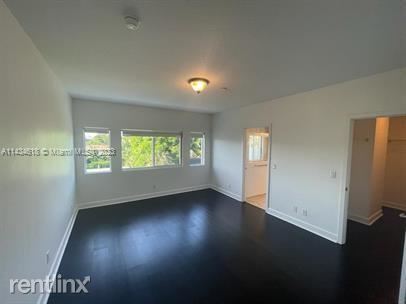 Building Photo - 3 br, 3.5 bath House - 609 NE 28th St Unit...