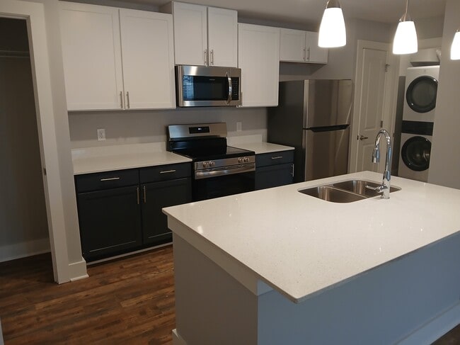 Kitchen Island with Quartz Countertops - Madison View Apartments