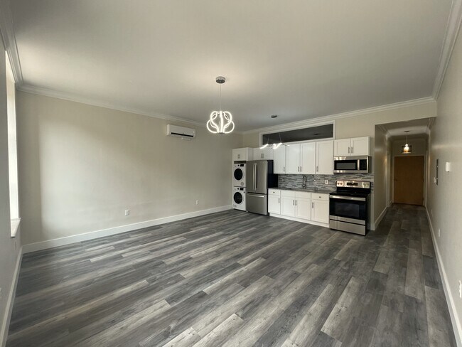 Cocina y sala de estar del apartamento - Mark Twain Building