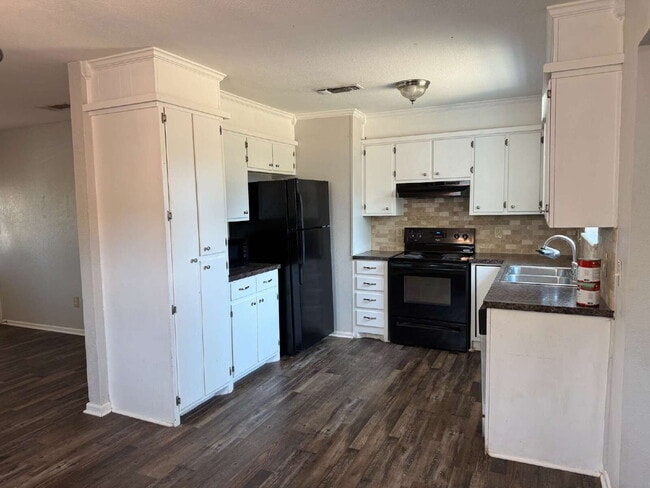 Building Photo - Updated 3 bedroom one bath home with a shade tree and large yard.