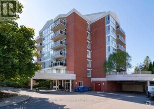 Building Photo - 1071-1071 Queens Ave