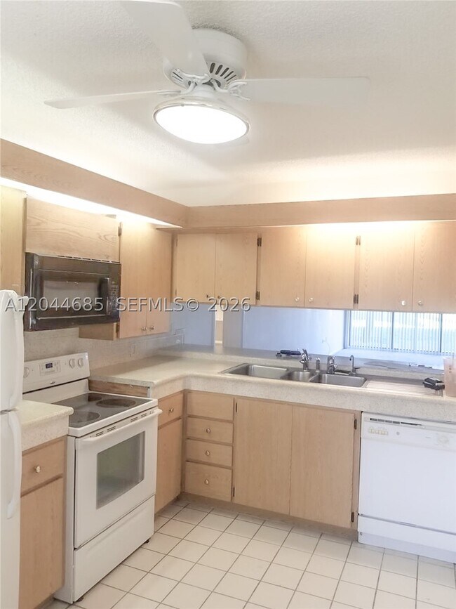 Building Photo - 2621 Village 102 Vlg