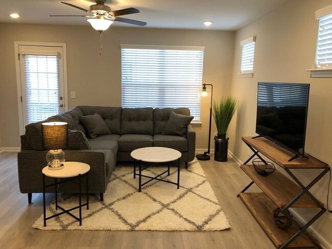 Building Photo - Brand New FURNISHED End Unit Townhome