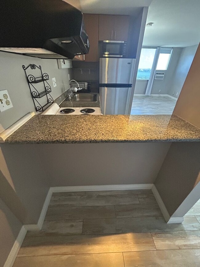 Building Photo - Available on 12/09/25, 360 sq ft Studio, 1 Bath, 1 covered assigned stall, Condo Unit at Century ...