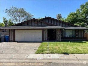 Building Photo - 700 Los Lunas Way