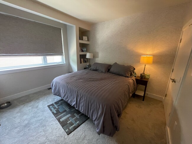 Primary bedroom with en suite with king bed - 3215 12th St NE