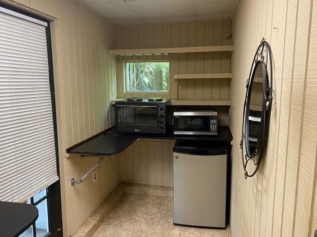 Building Photo - Affordable Efficiency Unit Available! Grea...