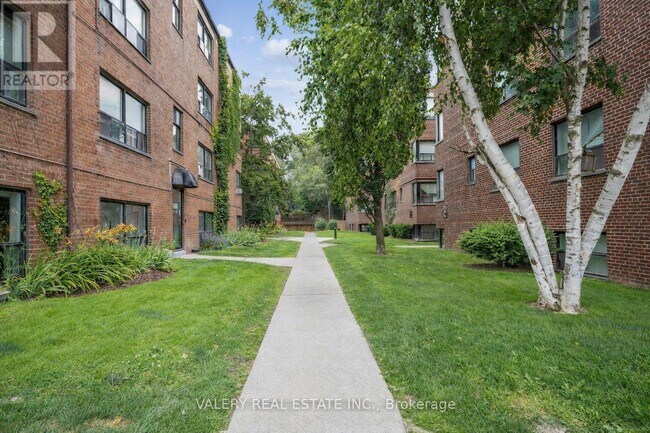 Building Photo - 3015 Queen St E