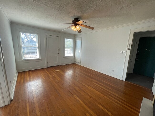 Building Photo - Charming 1 Bed + Bonus Room Near Cultural District — Hardwoods, Fireplace & Sunroom!