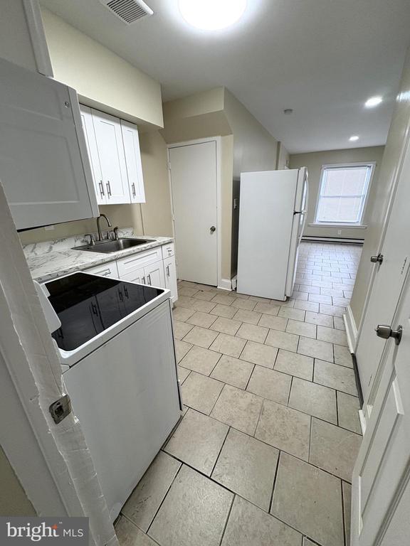 Foto del edificio - 3424 N American St