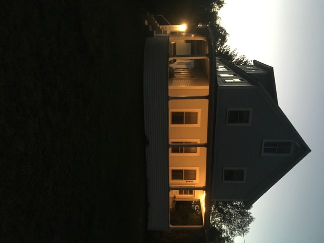 rope lights under front porch ceiling built in - Keene Rd. Duplex