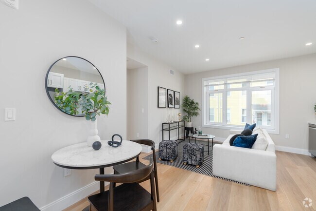 2 habitaciones, 2 baños - 662 pies cuadrados - Sala de estar - The Nia