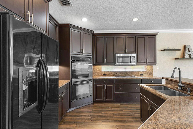 Building Photo - 15831 Menton Bay Ct