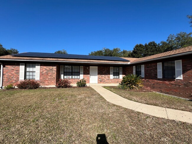 Building Photo - Spacious and In Town with Solar Panels