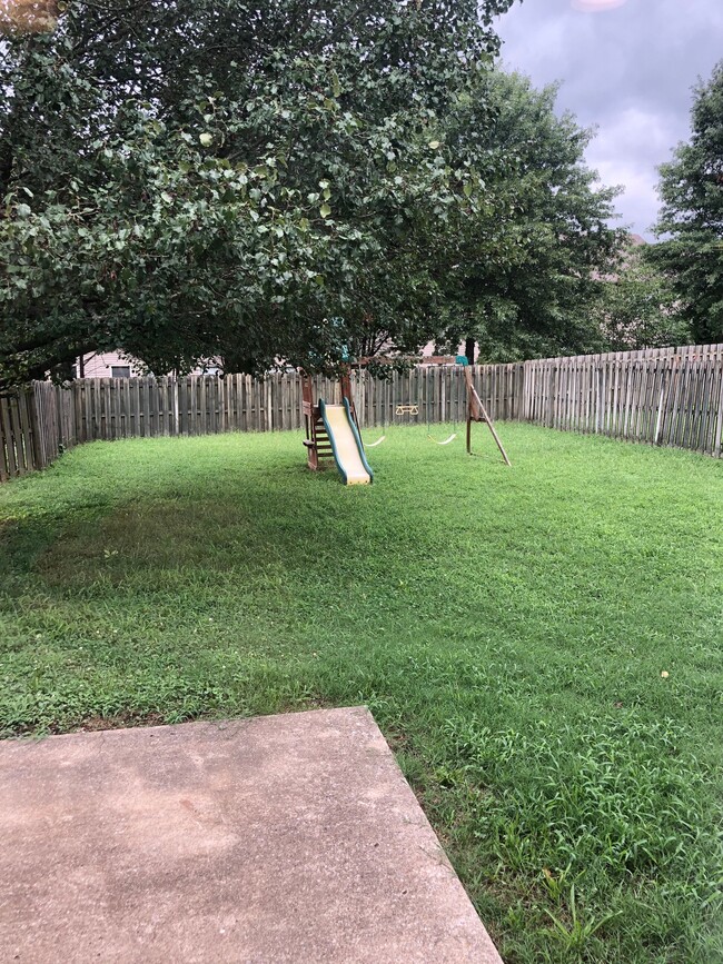 Back Yard with Swing Set - 1712 Stone Hollow Ct