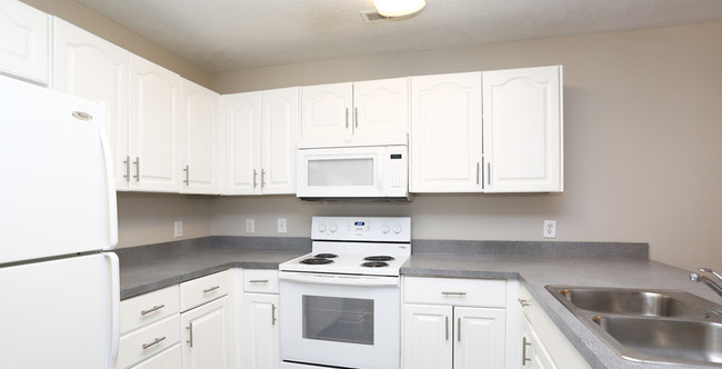 Enjoy plenty of storage and space in your kitchen at Karen Lake Apartments - Karen Lake Apartments