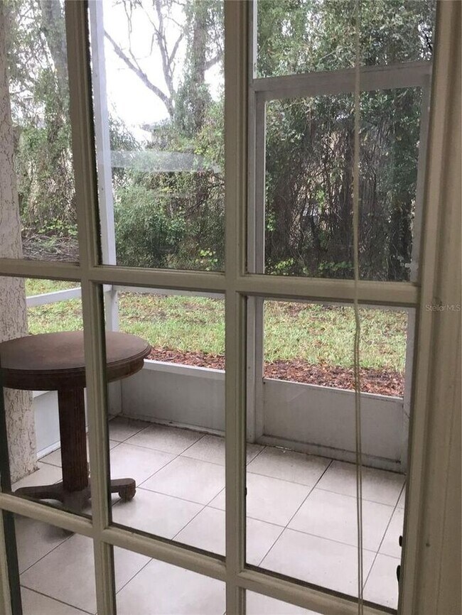 Foto del edificio - 2 Bedroom 2 Bath Corner Unit Ground Floor Condo Near UCF with Tile Flooring and Scenic View!