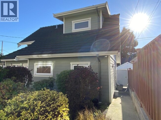 Photo du bâtiment - 2XX W 46th Ave