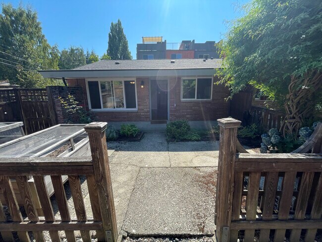 Unit exterior and private yard - 7327 38th Ave NE