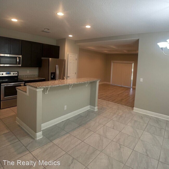 Foto del edificio - 3 br, 2.5 bath House - 8452 Magnificent Lane