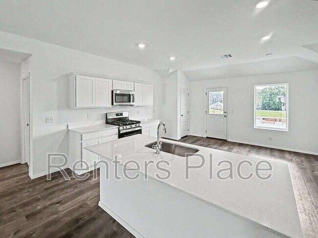 Foto del edificio - 7113 S Maple Ave