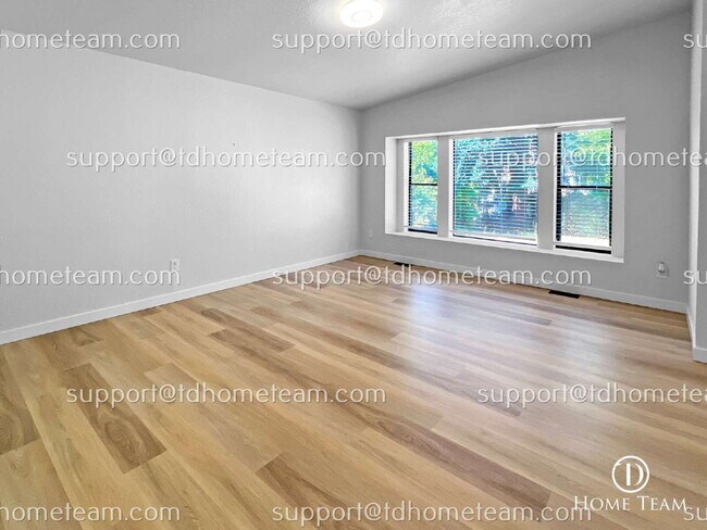 Building Photo - "Charming 3-Bedroom Retreat with Cozy Fire...