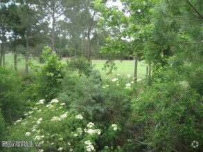 Building Photo - 1800 The Greens Way