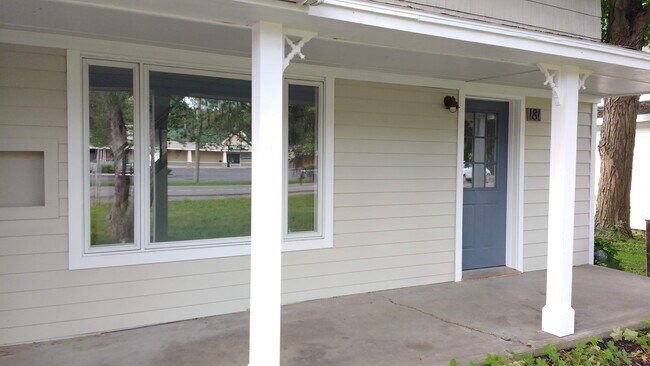 Newer exterior paint. Covered front porch. - 181 W Seneca St