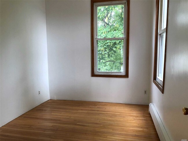 Building Photo - 14-23-23 118th St