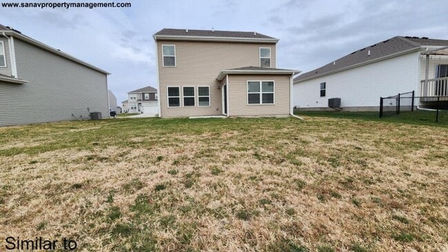 Building Photo - "Modern Luxury: Spacious 4-Bedroom Home with Open-Concept Design"