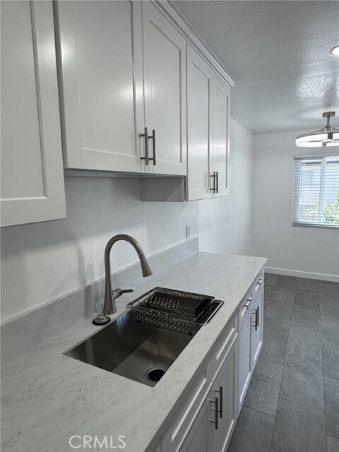 Building Photo - 7039 Remmet Ave