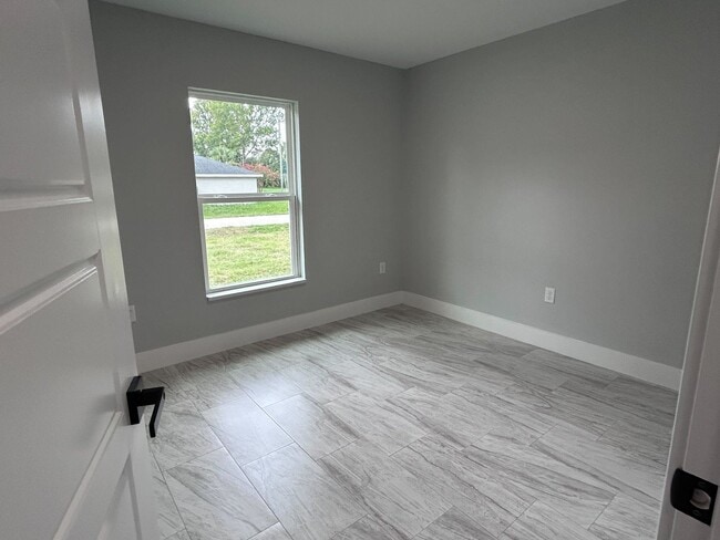 Building Photo - New 3/2 Home In Summerfield!