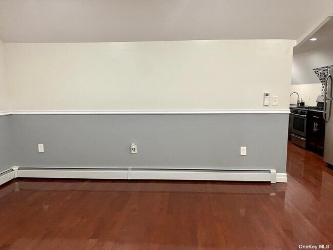 Building Photo - 218-12 118th Ave