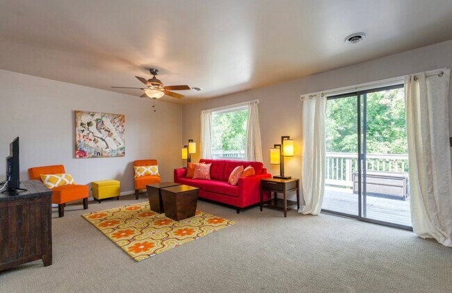 Living room with a view of the deck - 1709 Villa Plz
