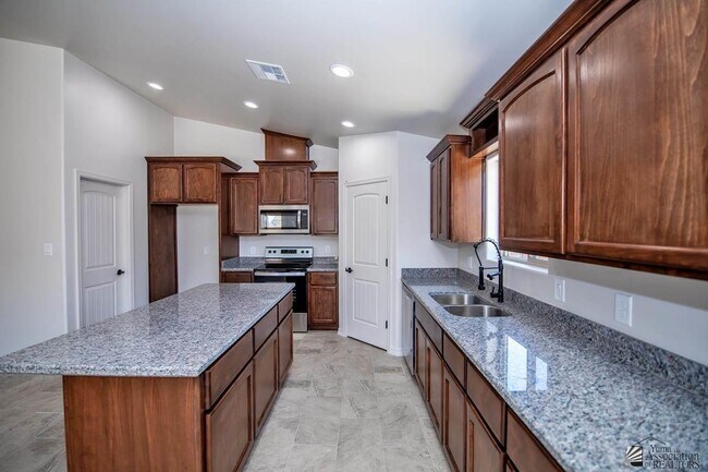 Foto del edificio - 12527 E 49th Dr