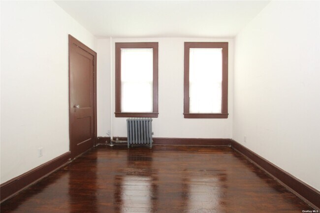 Building Photo - 18-06 120th St