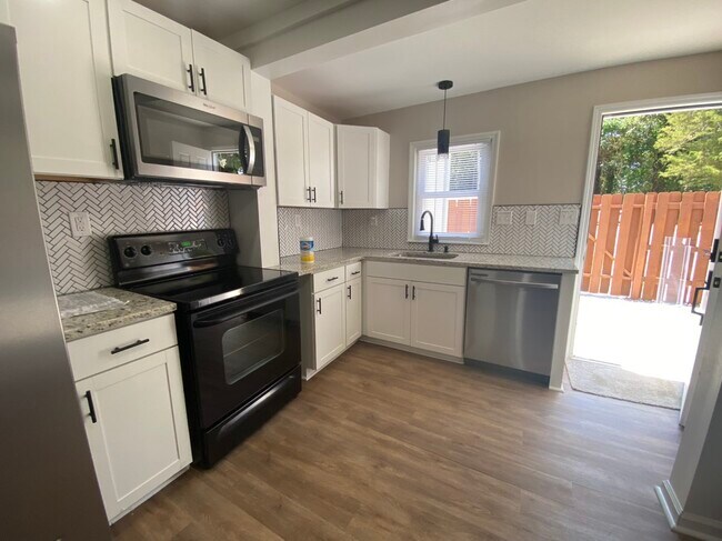 Kitchen and Back Patio - 311 Penniman Rd