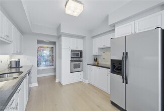 Building Photo - 7515 Pelican Bay Blvd